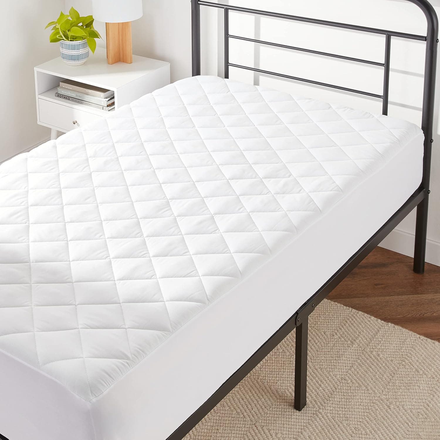 Listing image for Amazon Basics Quilted Mattress Topper Pad, Twin, 18 Inches Deep